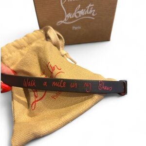 Limited Edition Christian Louboutin Black Bracelet with Red Script